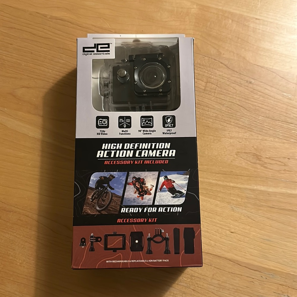 High definition action camera with accessory kit. Never used